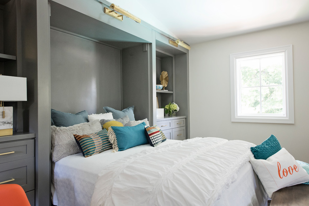 Bedroom - large eclectic guest medium tone wood floor and brown floor bedroom idea in Austin with white walls