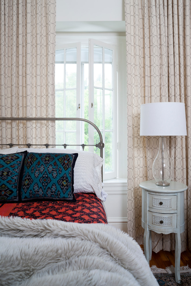 Example of an eclectic guest bedroom design in DC Metro with no fireplace
