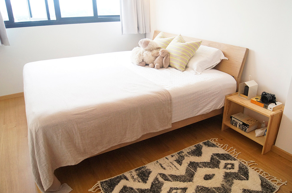 This is an example of a scandinavian bedroom in Singapore.