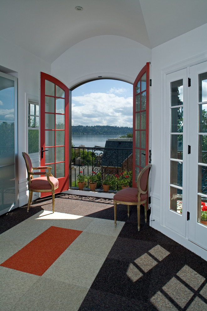 Inspiration for a mid-sized eclectic carpeted bedroom remodel in Seattle with white walls