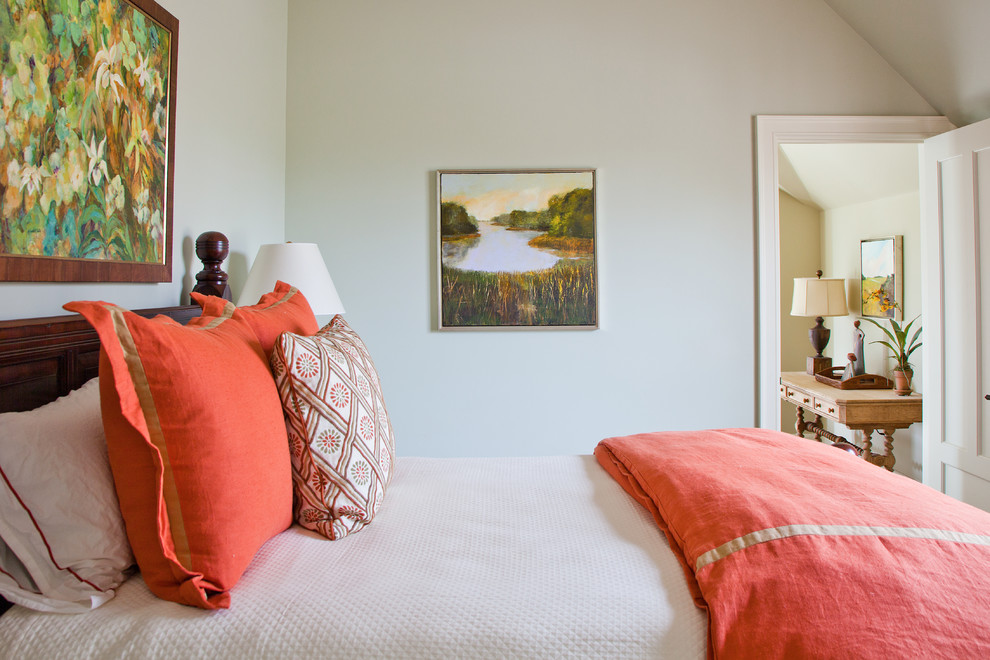 Photo of a classic guest bedroom in Atlanta with beige walls and medium hardwood flooring.
