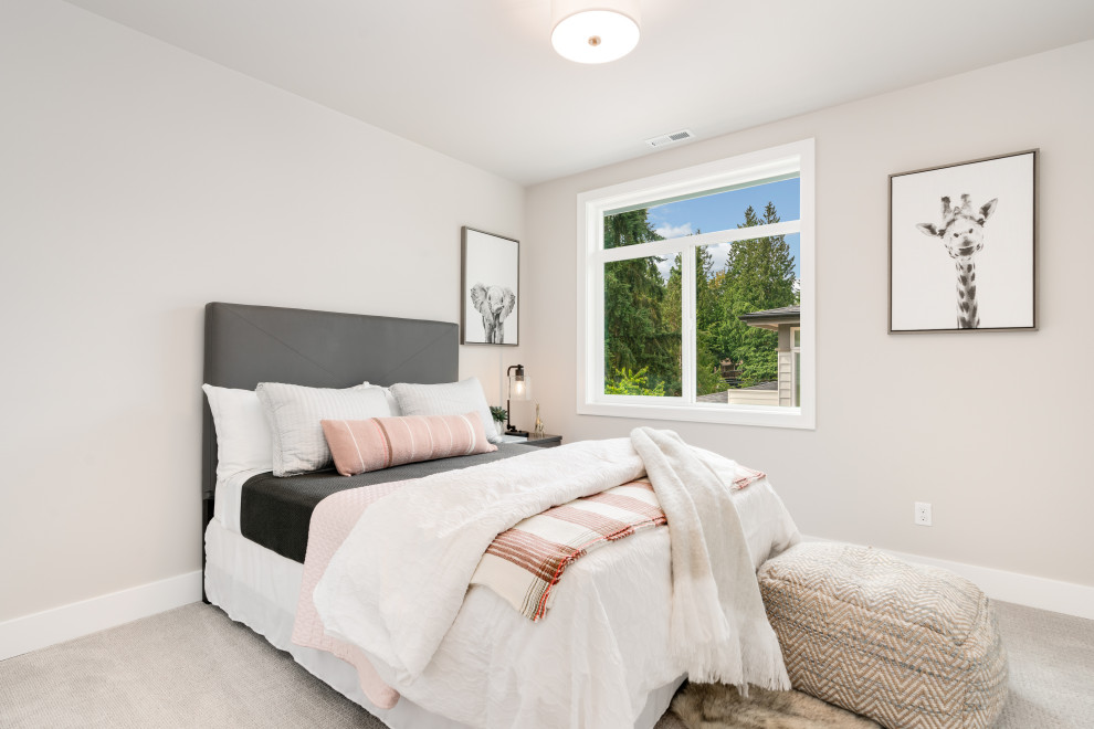 Photo of a large farmhouse guest bedroom in Seattle with grey walls, carpet, no fireplace and beige floors.