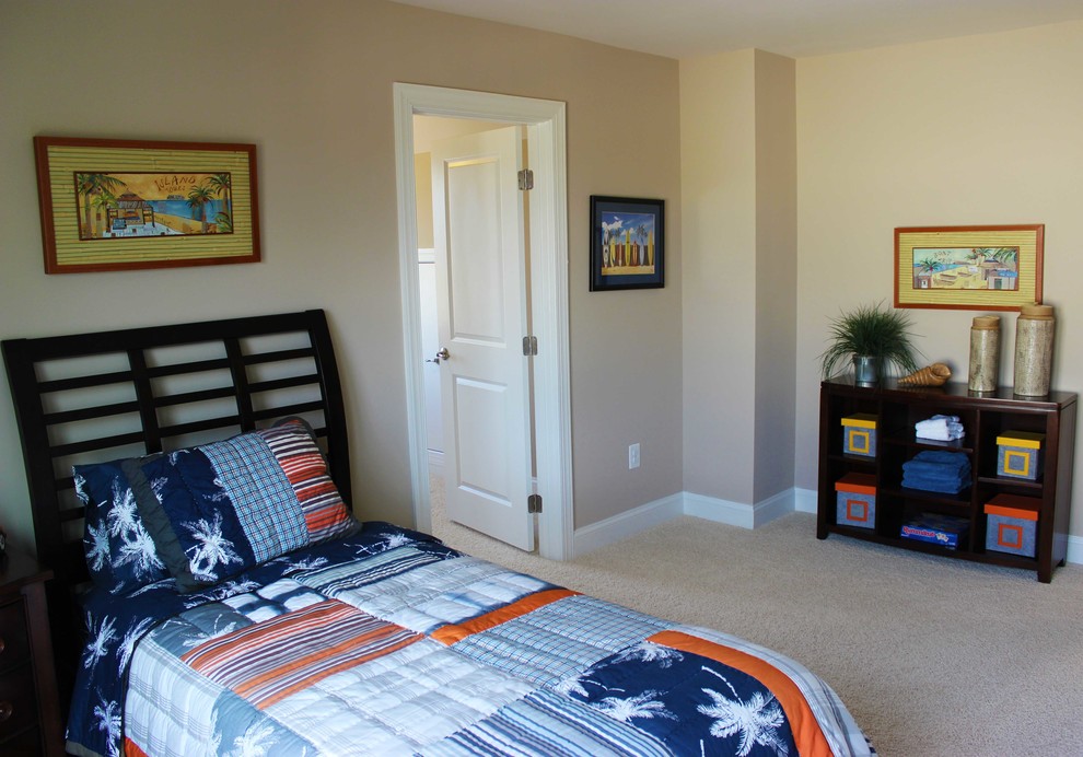 Photo of a nautical guest bedroom in Other with beige walls and carpet.