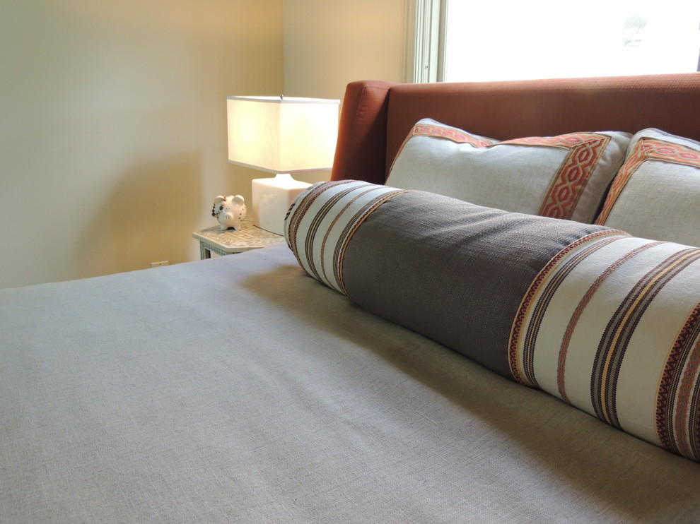 Traditional guest bedroom in San Diego with beige walls and carpet.