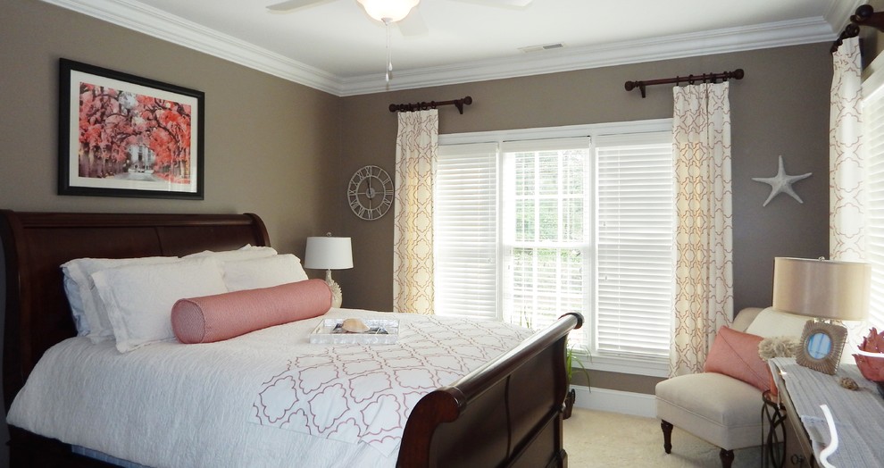 Medium sized traditional guest bedroom in Charlotte with grey walls, carpet and no fireplace.