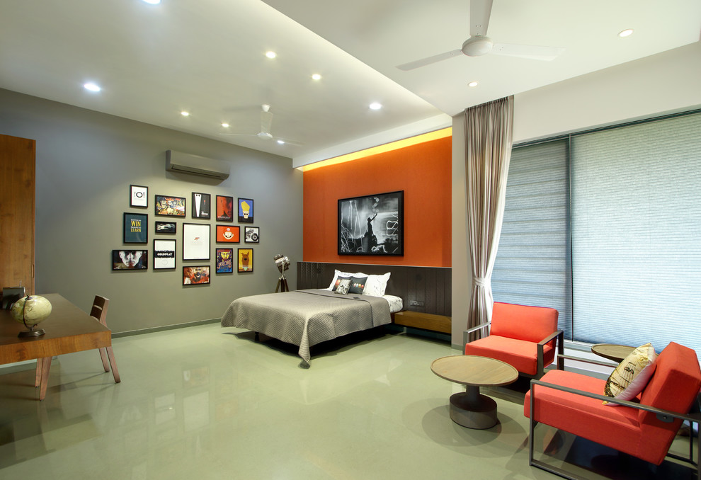 This is an example of a contemporary bedroom in Ahmedabad.