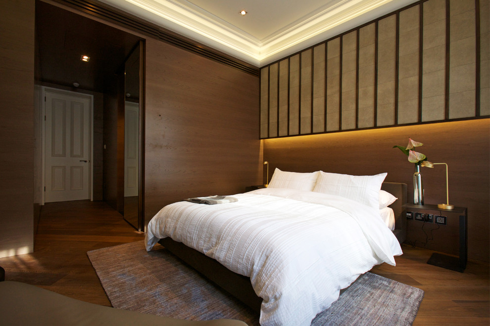 Example of a large trendy bedroom design in London