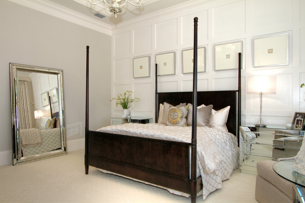 Transitional master carpeted bedroom photo in Tampa with beige walls and no fireplace