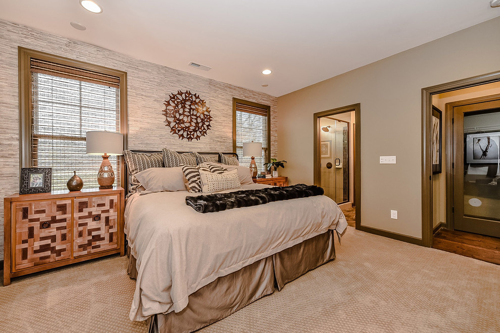Example of a mid-sized mountain style master carpeted bedroom design in Charlotte with multicolored walls