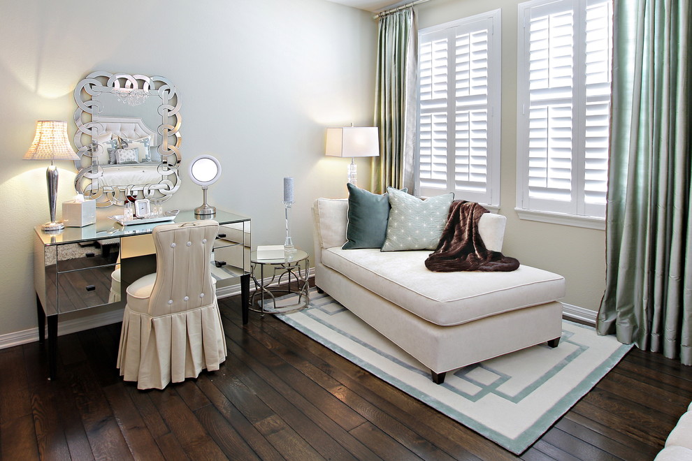 Inspiration for a contemporary dark wood floor bedroom remodel in Orange County with beige walls