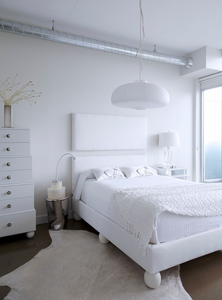 Trendy bedroom photo in Toronto with white walls