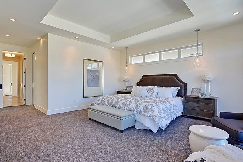 Bedroom - traditional master bedroom idea in Calgary with white walls