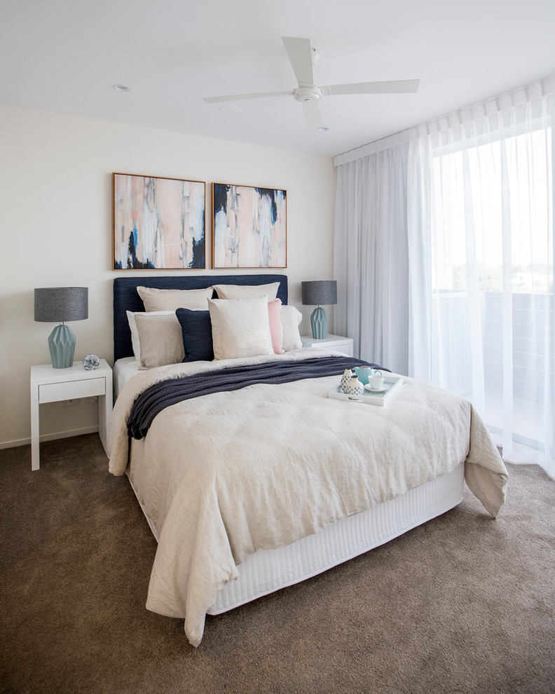This is an example of a modern grey and pink bedroom in Gold Coast - Tweed.