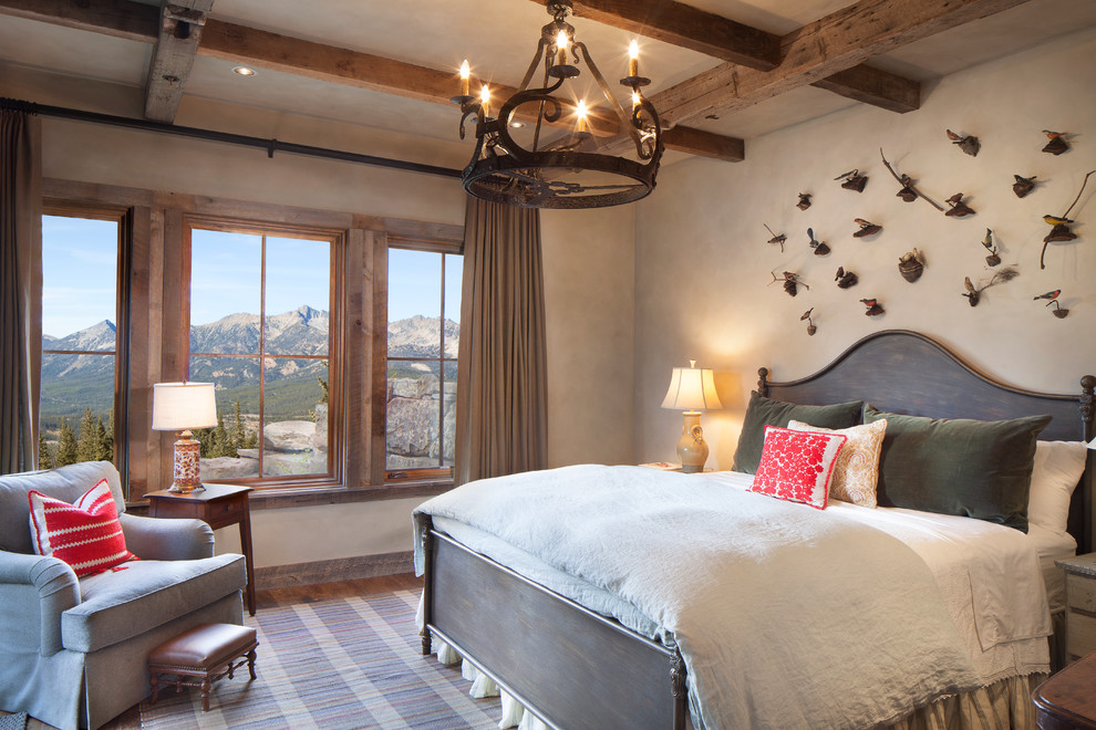 Esempio di una camera da letto stile rurale di medie dimensioni con pareti beige e parquet scuro