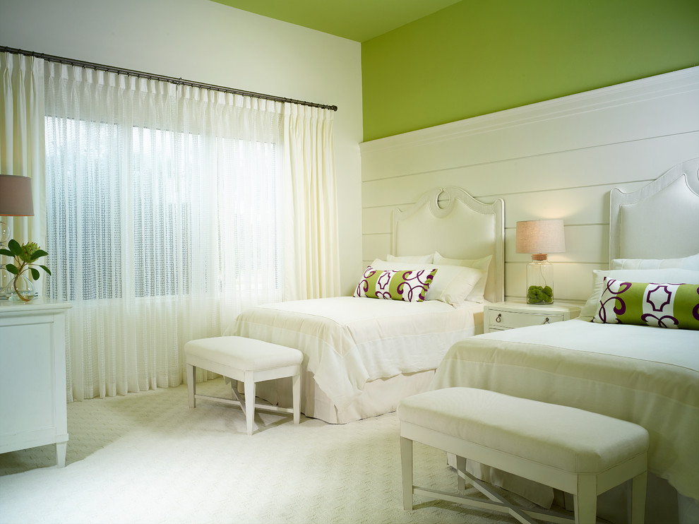 Bedroom - tropical guest carpeted bedroom idea in Miami with green walls