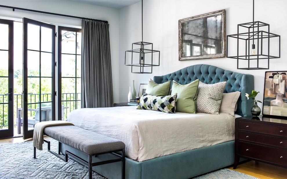 Inspiration for a transitional master bedroom remodel in Atlanta with white walls