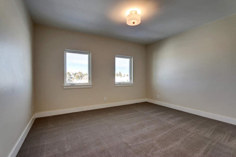 Mid-sized arts and crafts guest carpeted bedroom photo in Denver with beige walls