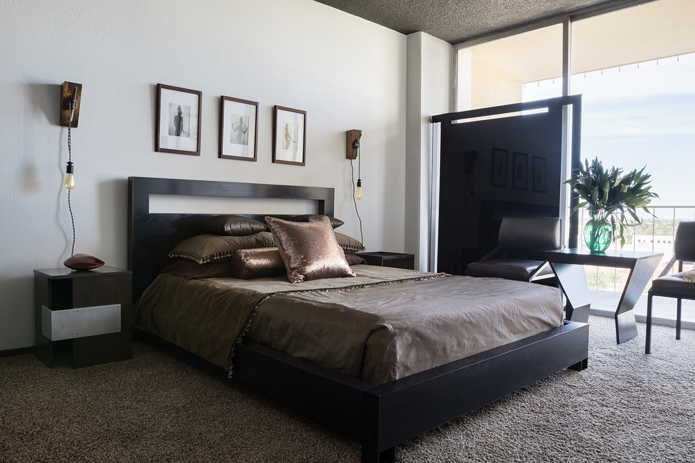 Esempio di una camera da letto design con pareti bianche, moquette e pavimento grigio