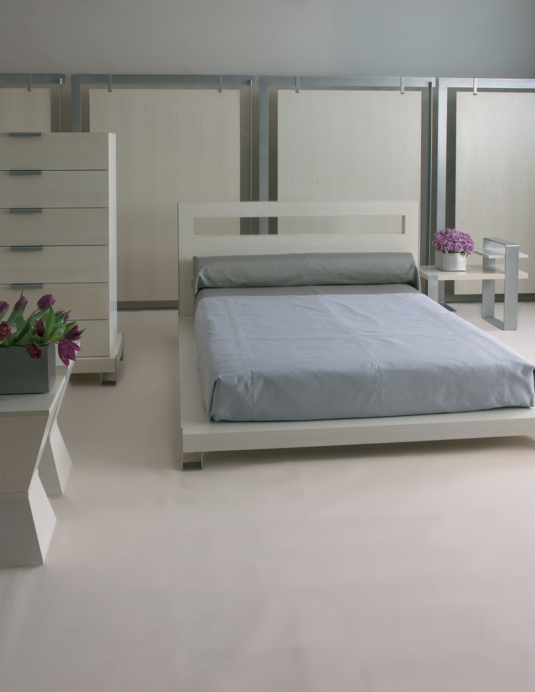 Ispirazione per una camera matrimoniale minimal con pareti bianche e pavimento in linoleum