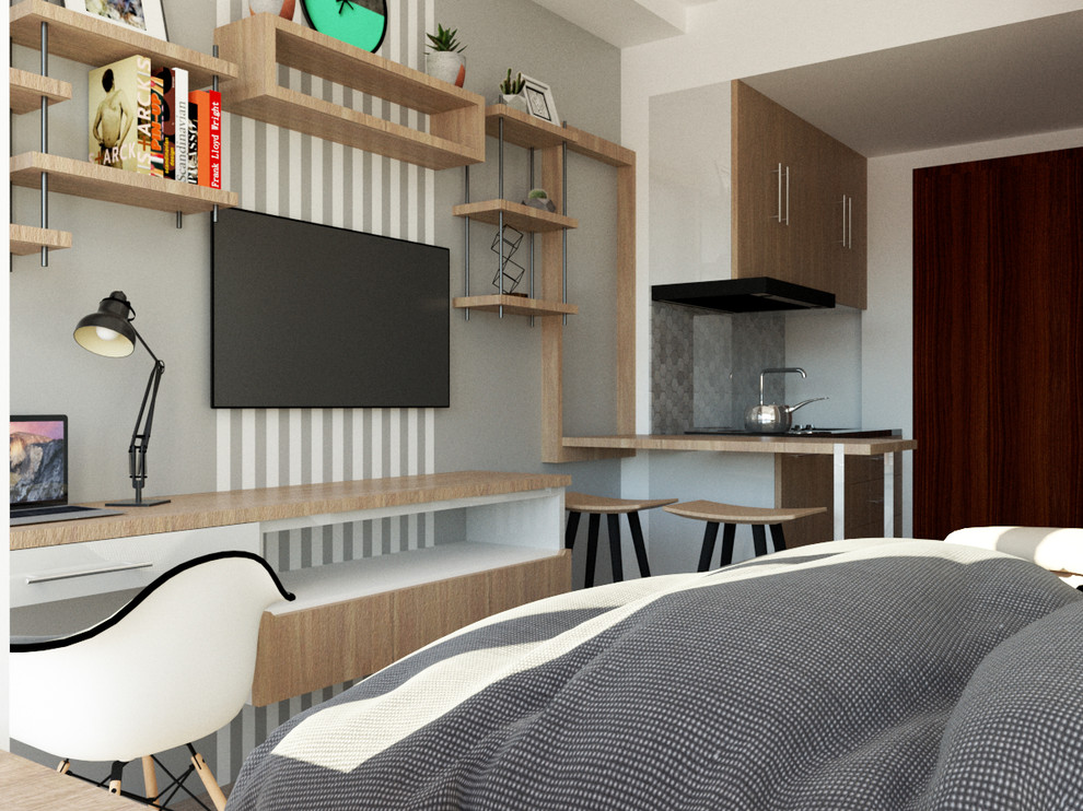 На фото: гостевая спальня среднего размера, (комната для гостей) в скандинавском стиле с серыми стенами, полом из винила и коричневым полом