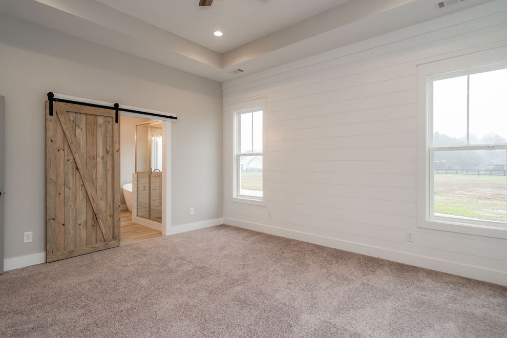 Example of a cottage bedroom design in Other