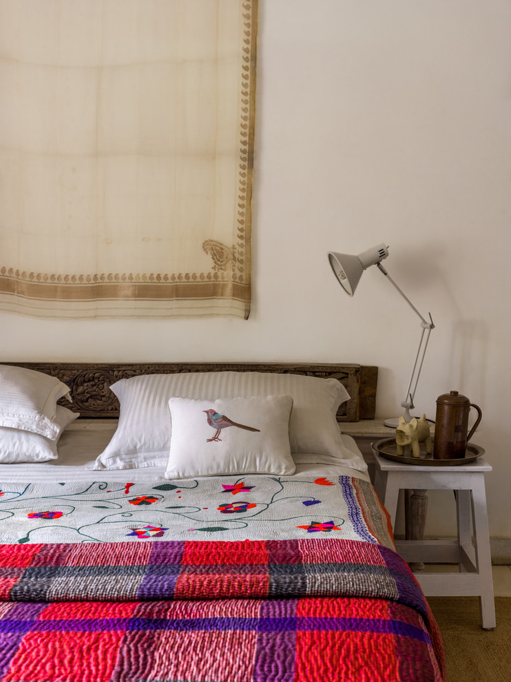 This is an example of an eclectic bedroom in Delhi.