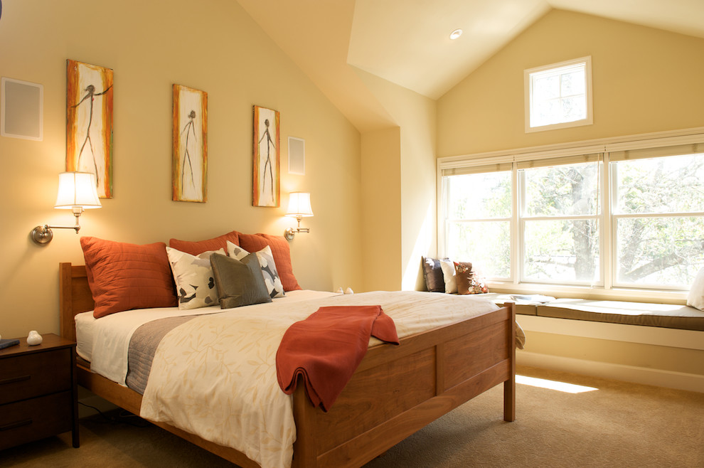 Inspiration for a contemporary bedroom in San Francisco with beige walls and carpet.