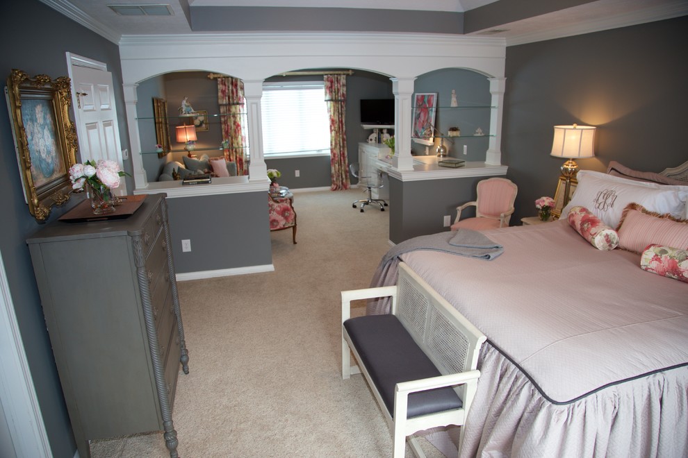 This is an example of a large traditional bedroom in Indianapolis with grey walls and carpet.