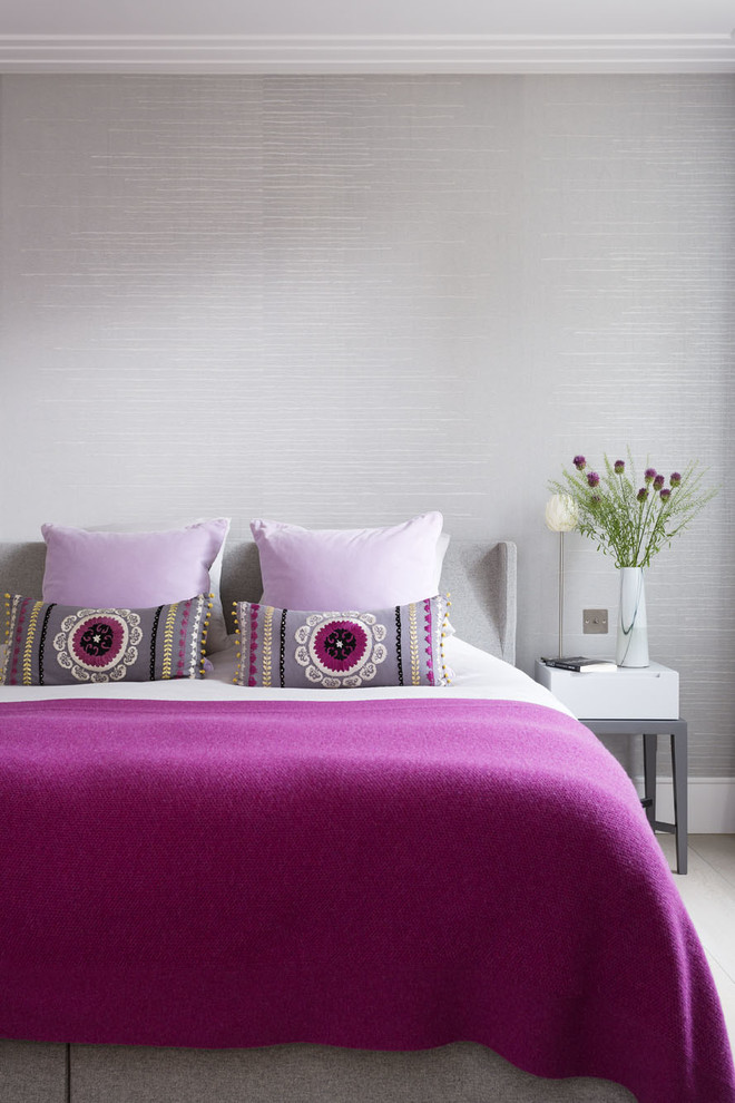 Inspiration for a contemporary grey and pink bedroom in London.