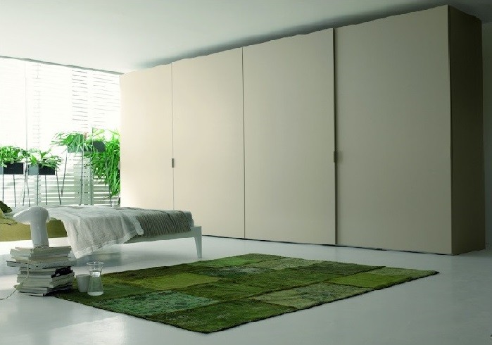 Example of a trendy bedroom design in Bologna