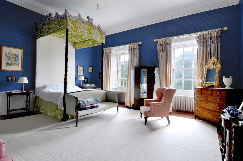 Traditional bedroom in Edinburgh with blue walls.