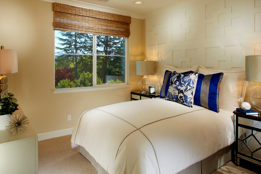 This is an example of a large classic master bedroom in San Francisco with beige walls and carpet.