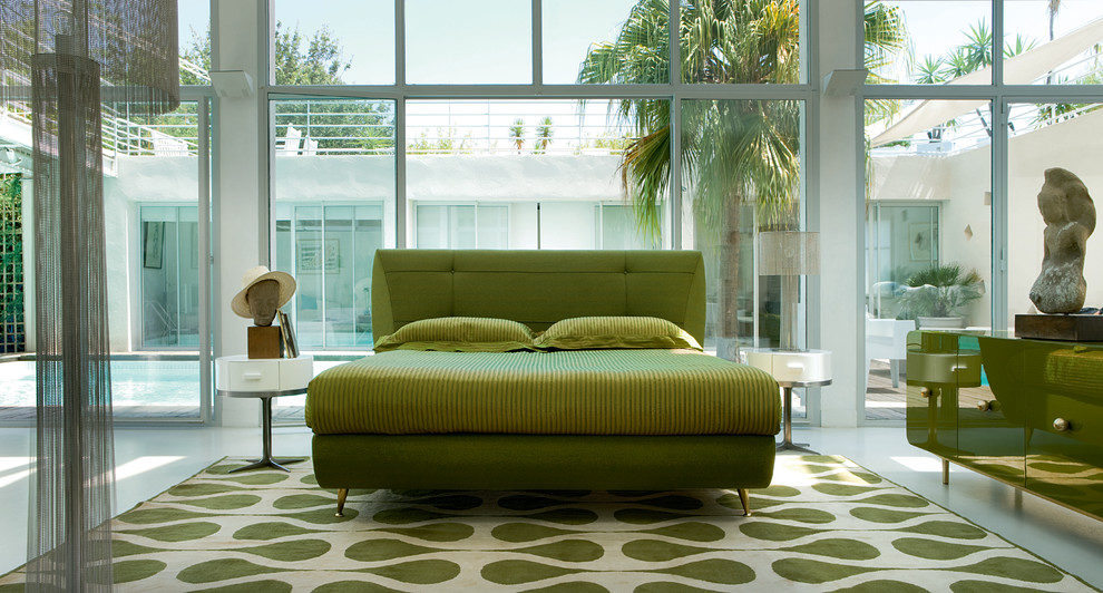 Idéer för ett modernt sovrum, med grönt golv