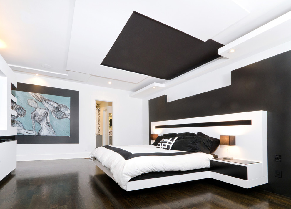 Bedroom - large modern master dark wood floor bedroom idea in Other with white walls
