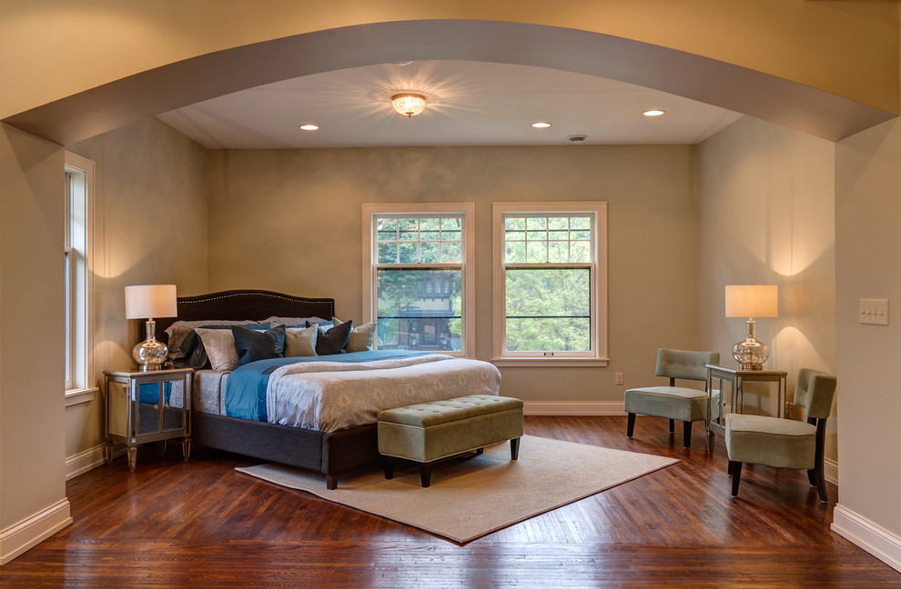 Inspiration for a timeless bedroom remodel in Minneapolis with beige walls