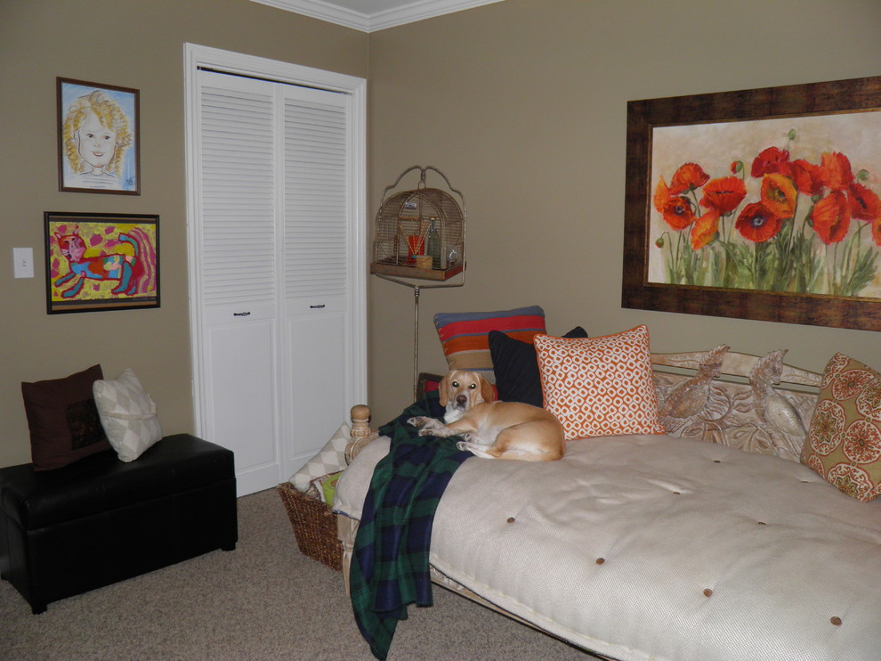Medium sized contemporary guest bedroom in Charlotte with brown walls.