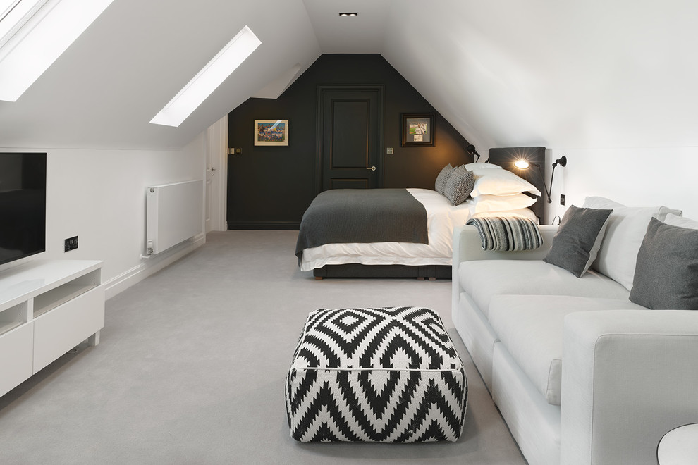 Photo of a contemporary loft bedroom in Kent with white walls, carpet and no fireplace.