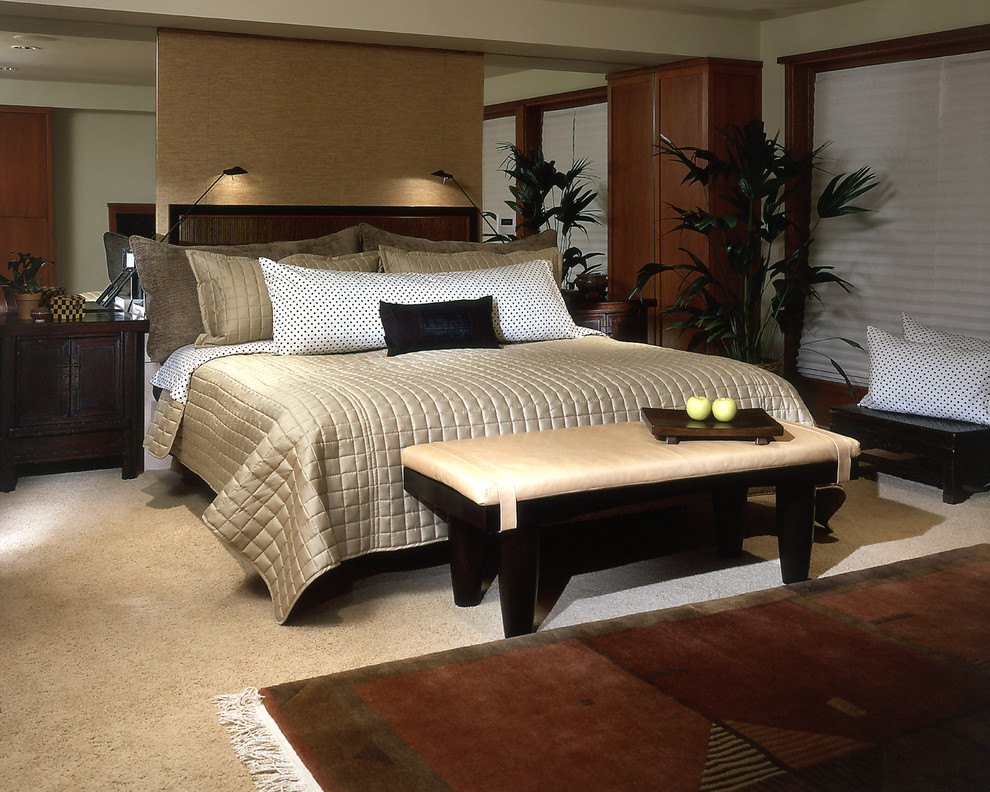 Example of a mid-sized carpeted bedroom design in Seattle with beige walls