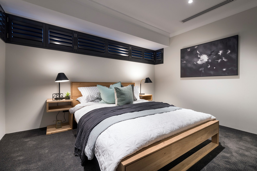 Стильный дизайн: гостевая спальня (комната для гостей) в восточном стиле с серыми стенами, ковровым покрытием и серым полом - последний тренд