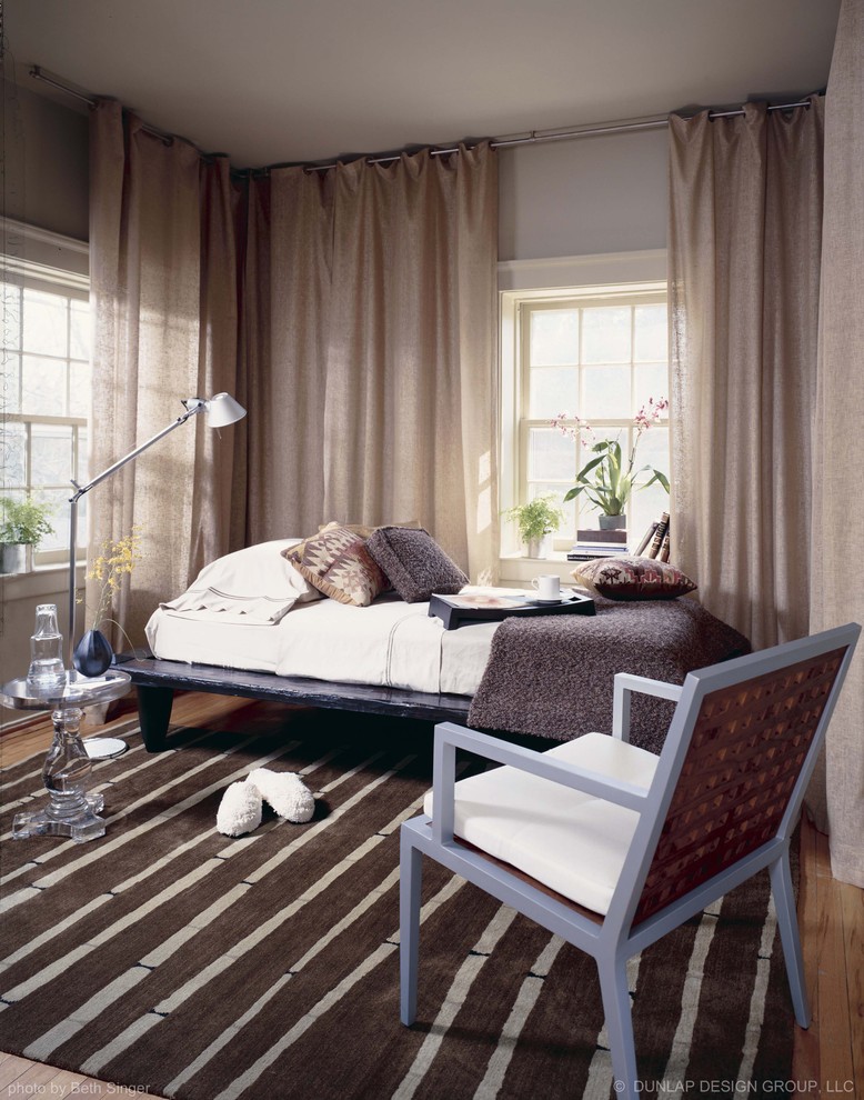 Example of an eclectic bedroom design in Detroit