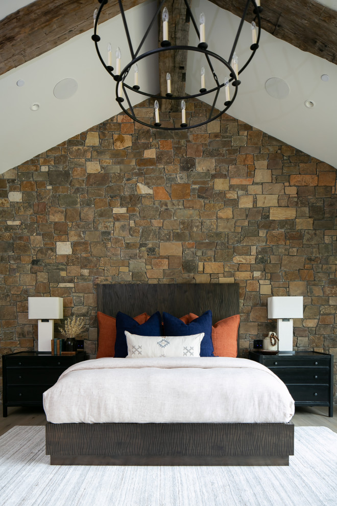 Photo of a rustic master bedroom in Jackson.