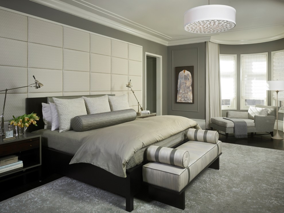 This is an example of a contemporary grey and cream bedroom in Chicago.