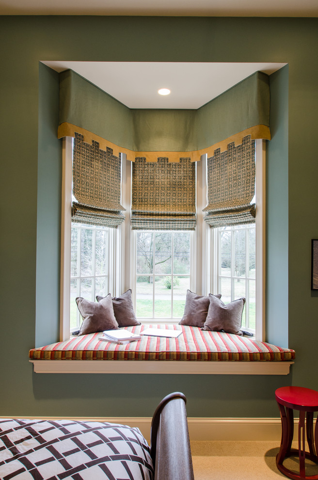 Mid-sized elegant carpeted bedroom photo in Nashville with green walls, no fireplace and a stone fireplace