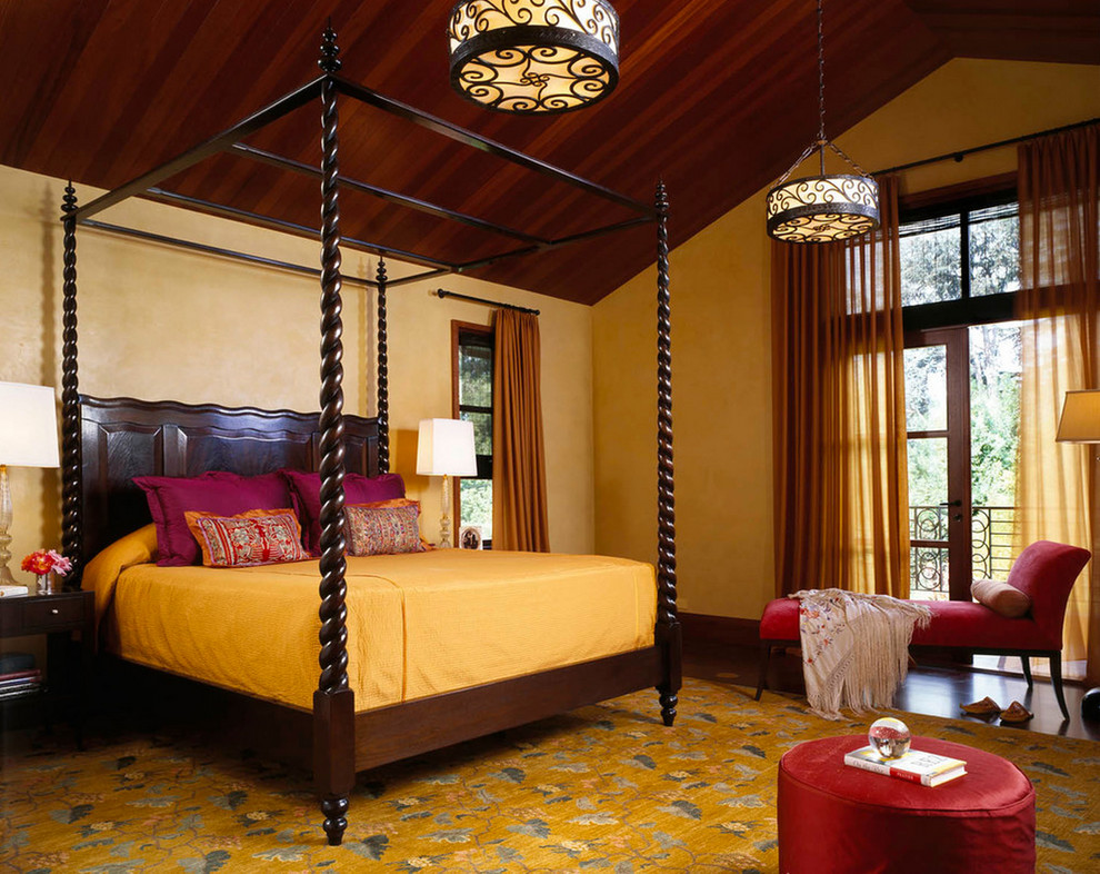 Huge elegant master dark wood floor bedroom photo in San Francisco with yellow walls