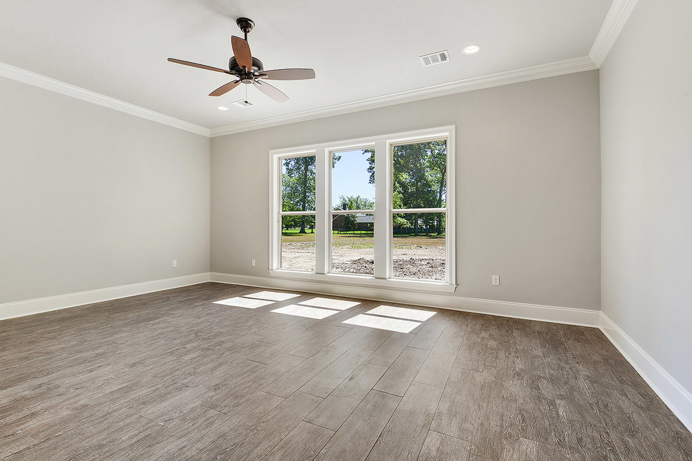 Design ideas for a country master bedroom in New Orleans with grey walls, ceramic flooring and brown floors.
