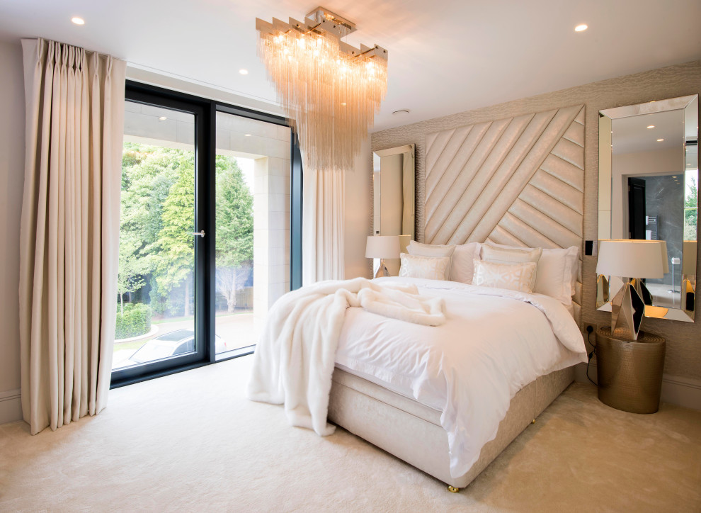 Inspiration for a large contemporary guest carpeted, white floor and wallpaper bedroom remodel in Cheshire with beige walls