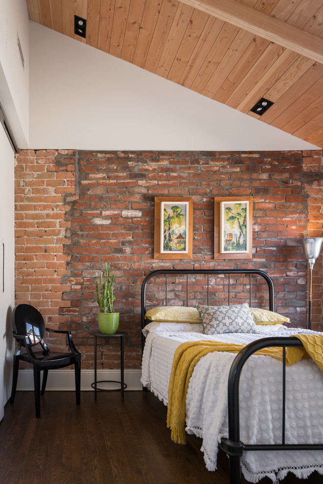 Bedroom - industrial dark wood floor bedroom idea in Phoenix with white walls