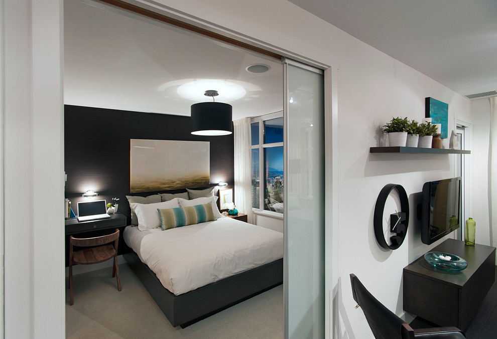 Trendy bedroom photo in Vancouver with white walls and no fireplace