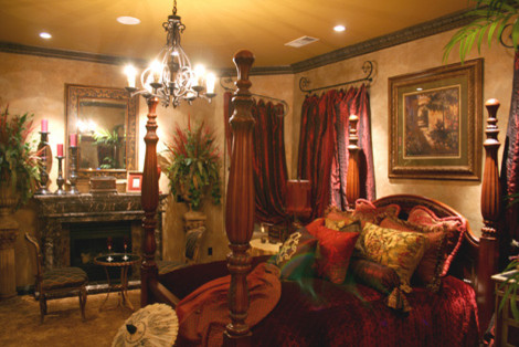 Example of a tuscan bedroom design in Los Angeles