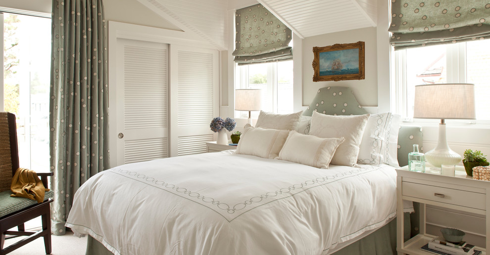 Beach style bedroom photo in Orange County with gray walls and no fireplace